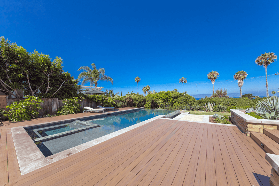 Happy homeowner enjoying TimberTech deck